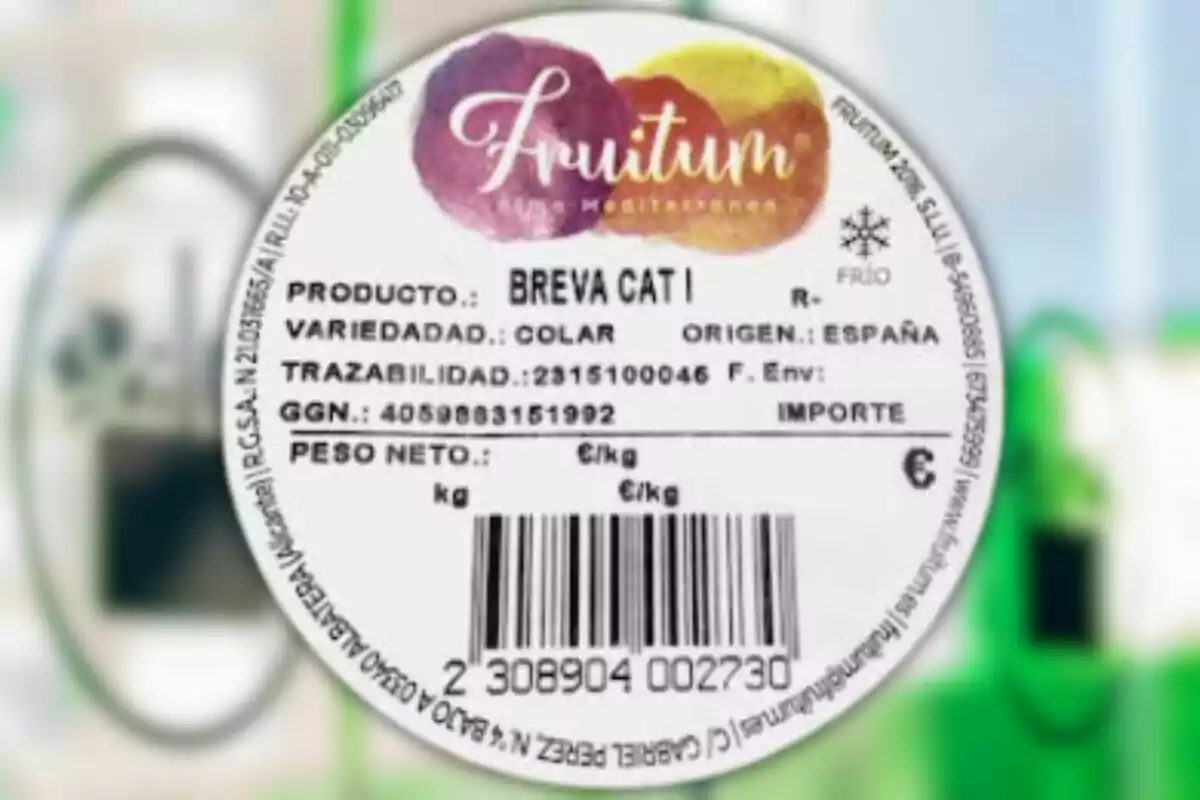 Etiqueta rodona de producte Fruitum amb informació sobre breva varietat colar origen Espanya pes net codi de barres i logotip colorit a la part superior Etiqueta rodona de producte Fruitum amb informació sobre breva varietat colar origen Espanya pes net codi de barres i logotip colorit a la part superior