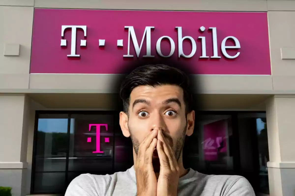 A man surprised in front of a T-Mobile store.