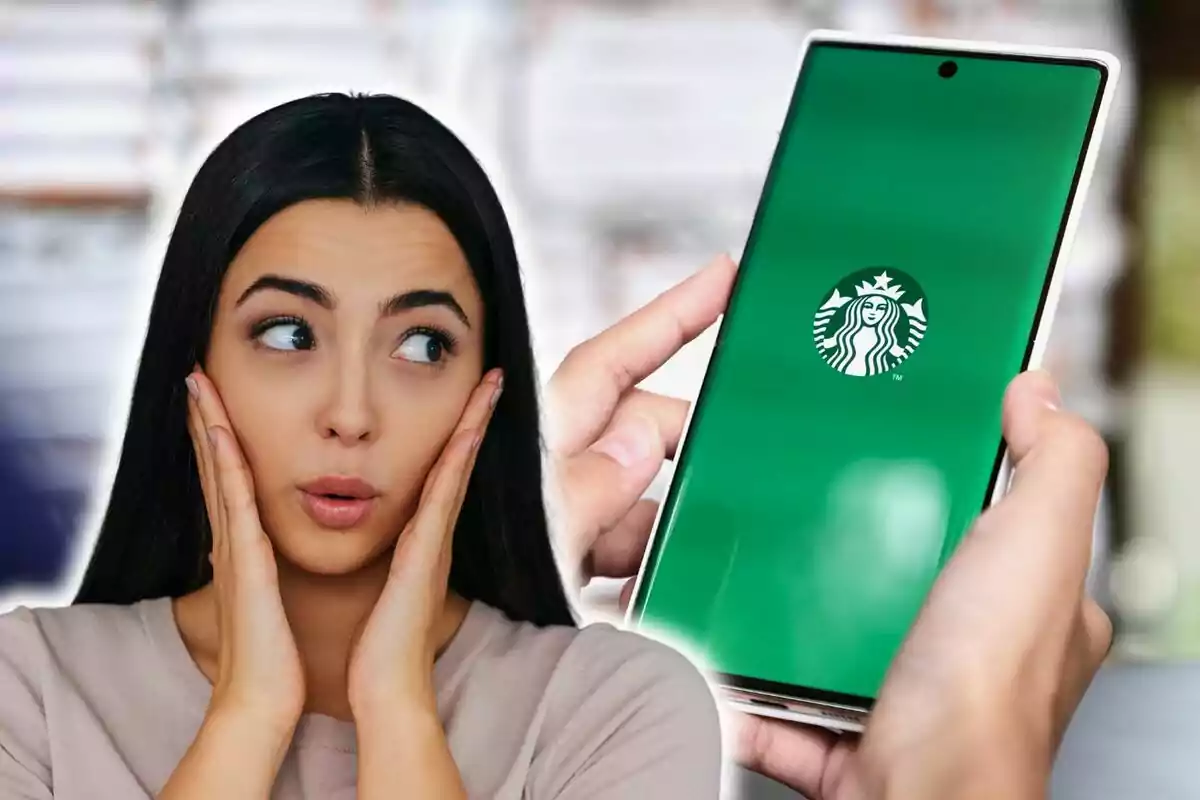 Una dona amb expressió sorpresa mentre observa un telèfon mòbil amb el logotip de Starbucks a la pantalla.