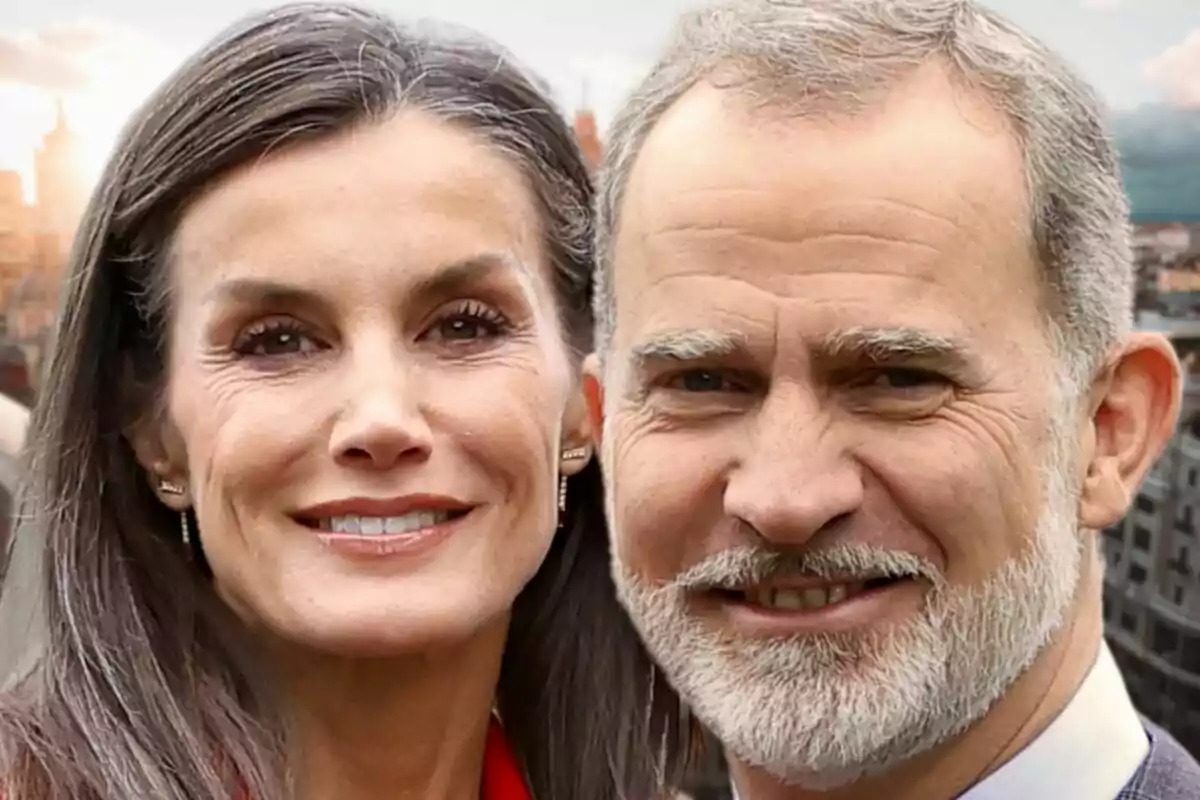 Close-up photo montage of King Felipe of Bourbon and Queen Letizia Ortiz, both smiling outdoors with buildings in the background.