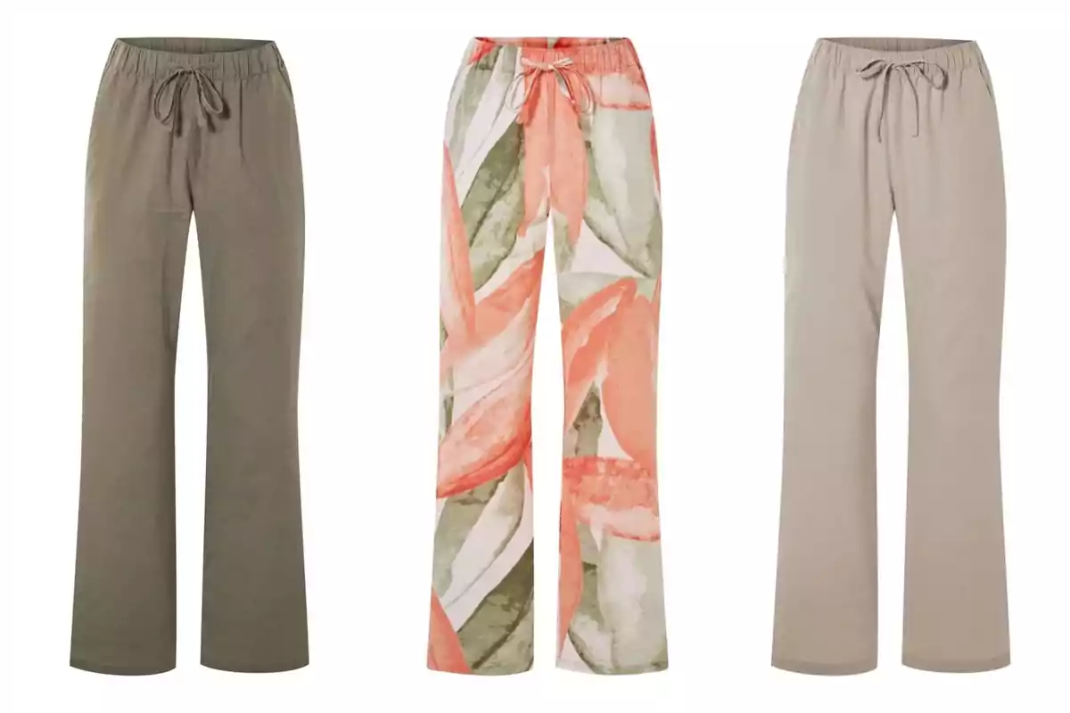 Tres pantalons de dona amb cintura elàstica i cordó de Lidl, un verd oliva, un altre amb estampat de fulles en tons corall i verd, i el tercer de color beix clar. Tres pantalons de dona amb cintura elàstica i cordó de Lidl, un verd oliva, un altre amb estampat de fulles en tons corall i verd, i el tercer de color beix clar.