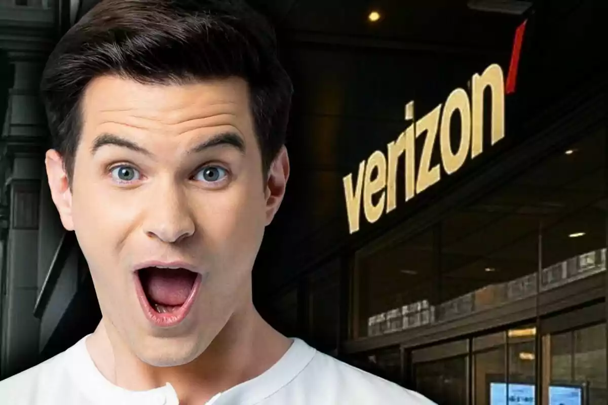 Un home amb expressió de sorpresa davant d'un edifici amb el logotip de Verizon. Un home amb expressió de sorpresa davant d'un edifici amb el logotip de Verizon.