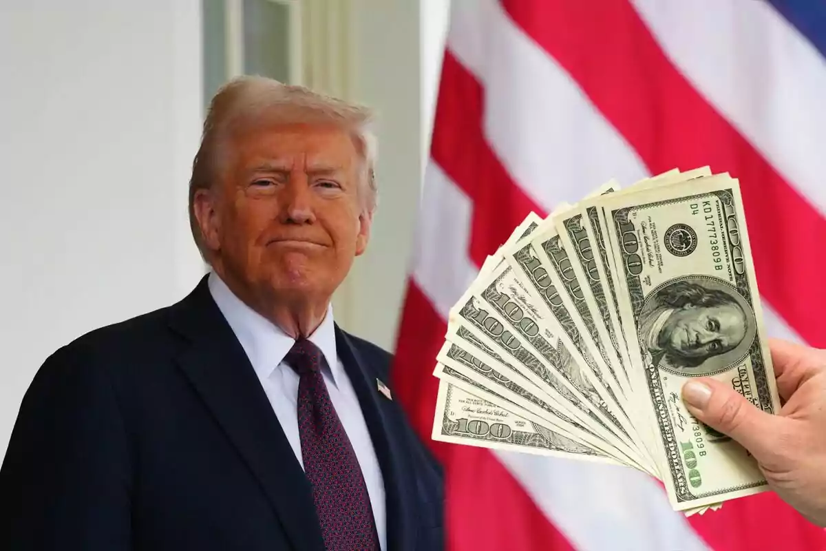 Man in a suit with a serious expression and hundred-dollar bills in the foreground against a background of the American flag