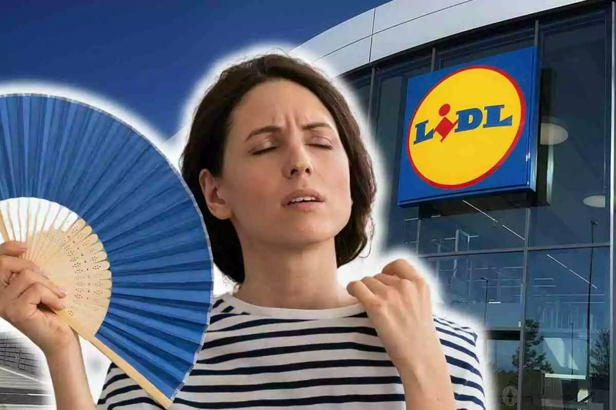 Dona amb expressió de calor ventant-se davant d’una botiga Lidl