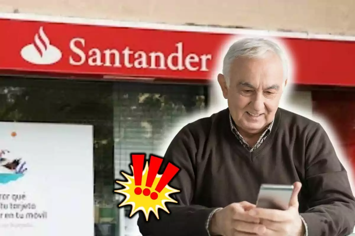 Un home gran somriu mentre mira el telèfon davant d'una sucursal del Banco Santander amb un gràfic d'exclamació a la cantonada.