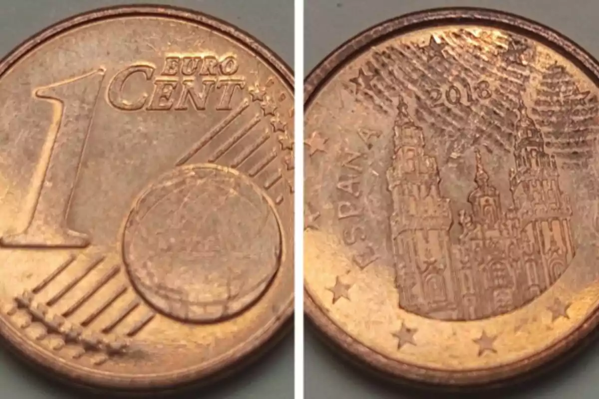 Moneda d'1 cèntim d'euro amb disseny d'Espanya i catedral al revers.