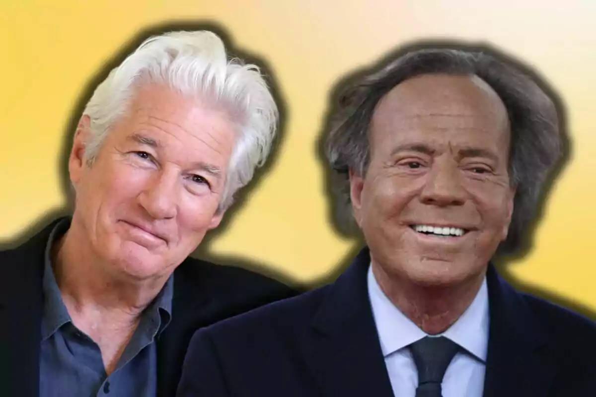 George Clooney and Julio Iglesias smile in front of a blurred yellow background.