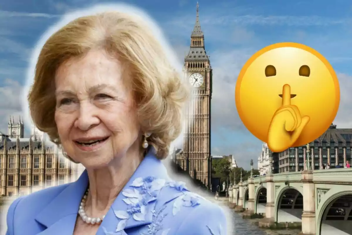 La reina Sofia somrient amb cabell ros i un vestit blau clar davant del Big Ben a Londres amb un emoji de silenci al costat.