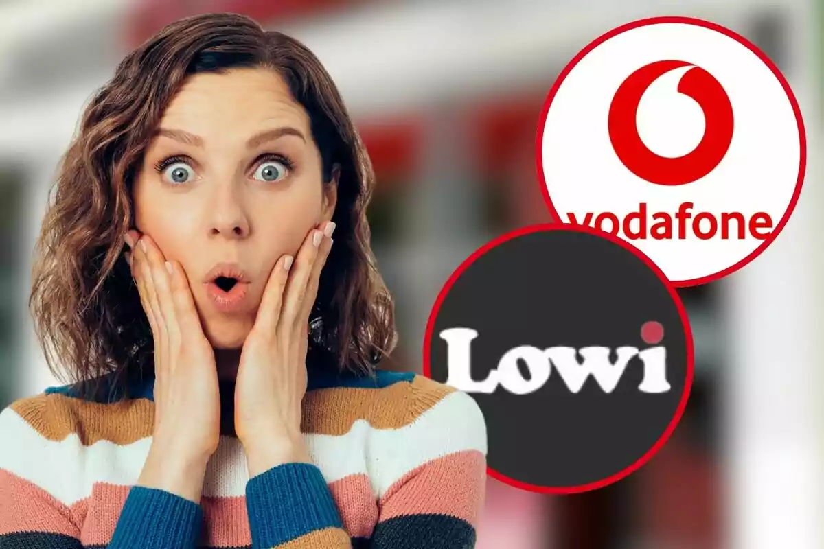 Una dona amb expressió de sorpresa, amb les mans a les galtes, i els logotips de Vodafone i Lowi al fons.