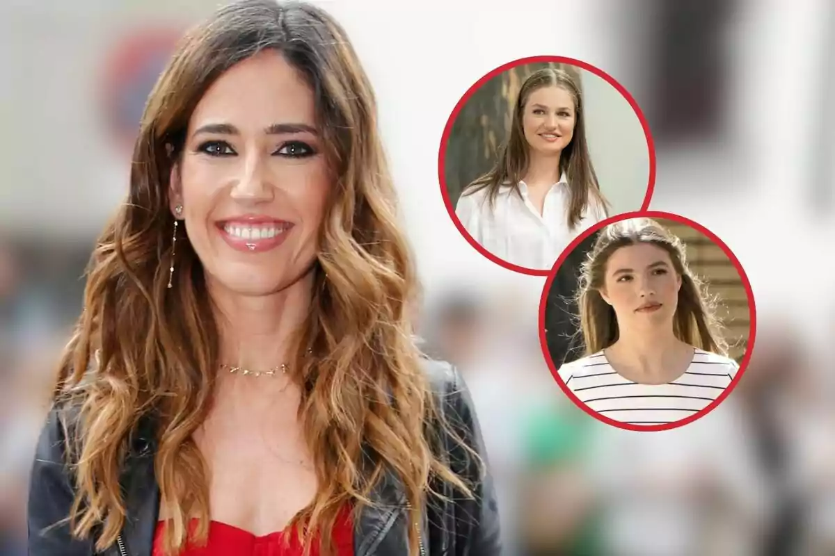 Nuria Marín somrient amb cabells llargs i ondulats, vestida amb una jaqueta negra i una brusa vermella, amb dues imatges circulars d'altres de la princesa Leonor i la infanta Sofia al fons.