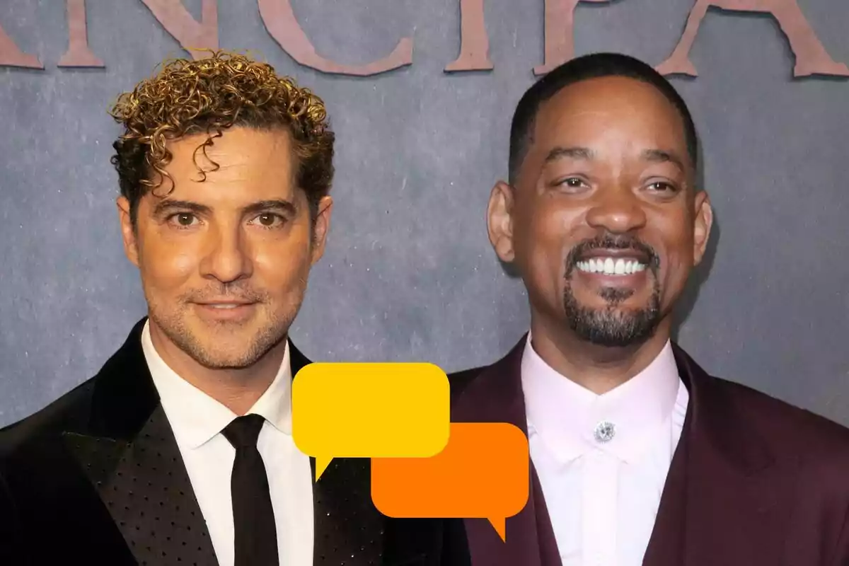 David Bisbal i Will Smith posant en un esdeveniment formal, David amb vestit negre i Will amb vestit bordeus, tots dos somrient davant d'un fons gris amb lletres grans.