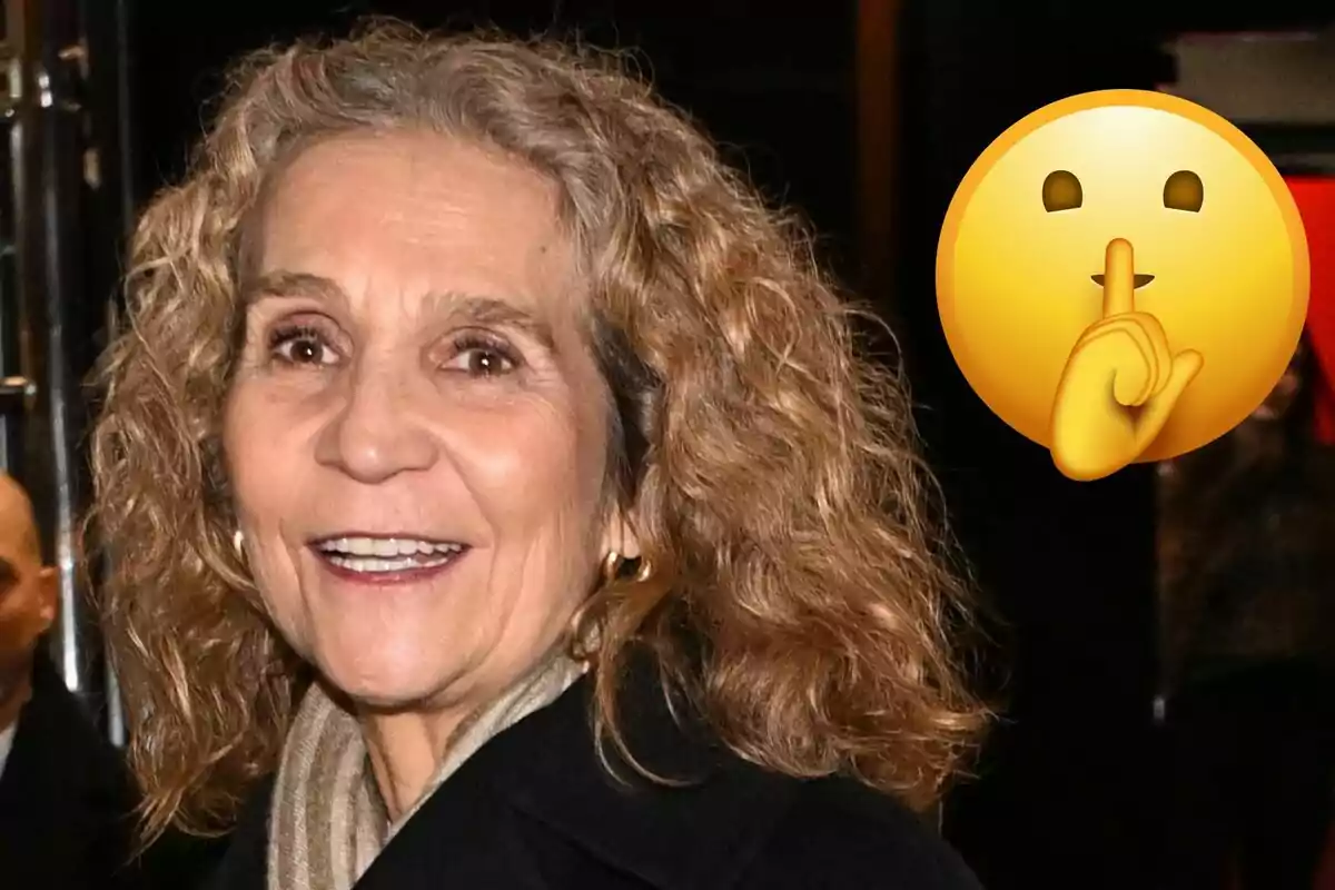 La infanta Elena somrient amb cabell arrissat al costat d'un emoji de silenci.