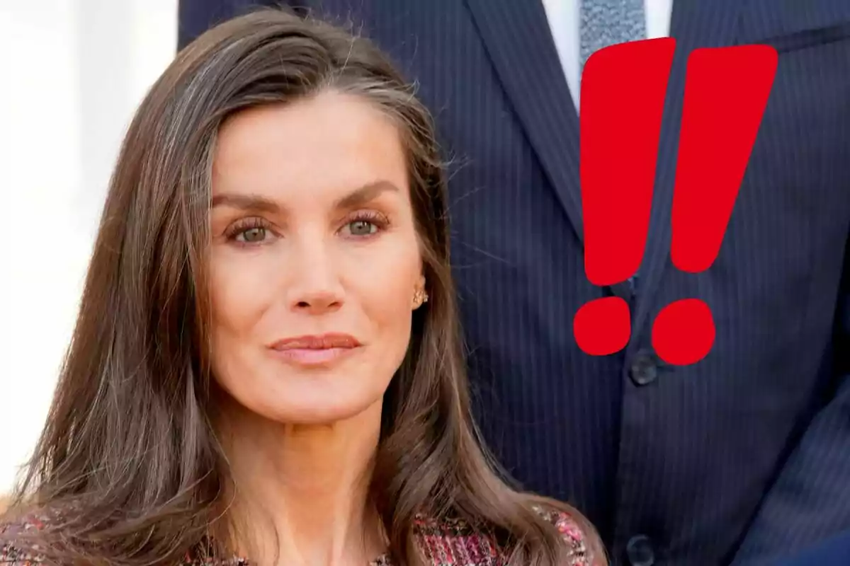 Queen Letizia with a serious expression and red exclamation marks next to her.