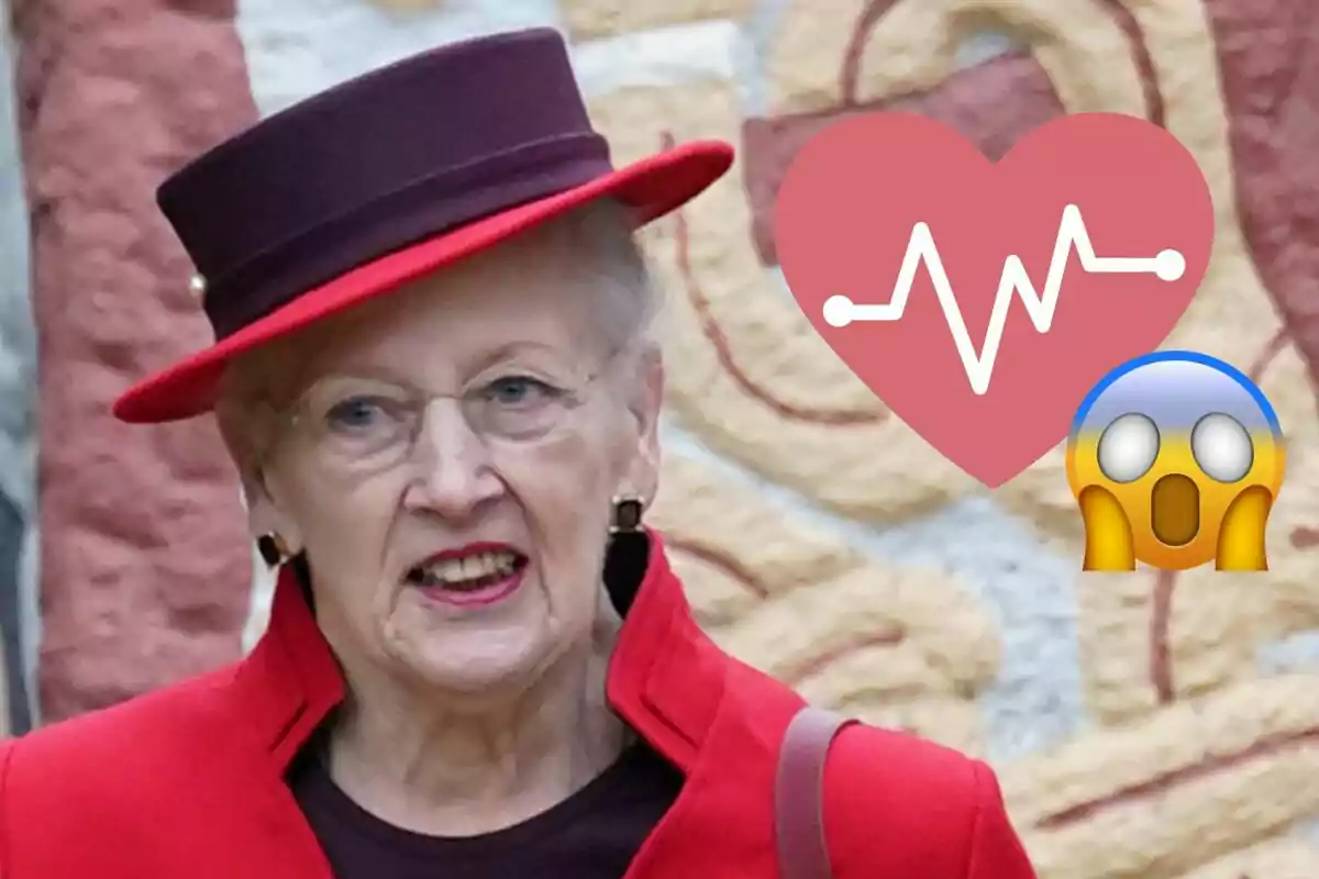 La reina Margarida amb barret vermell i negre, al costat d'un emoji de cor amb línia de pols i un emoji sorprès.