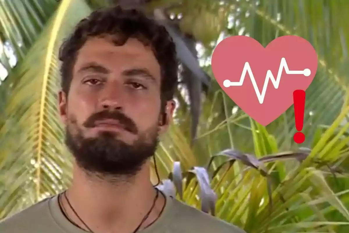 Joshua Velázquez amb expressió seriosa davant d'un fons de fulles de palmera, amb un gràfic de cor i un signe d'exclamació superposat.
