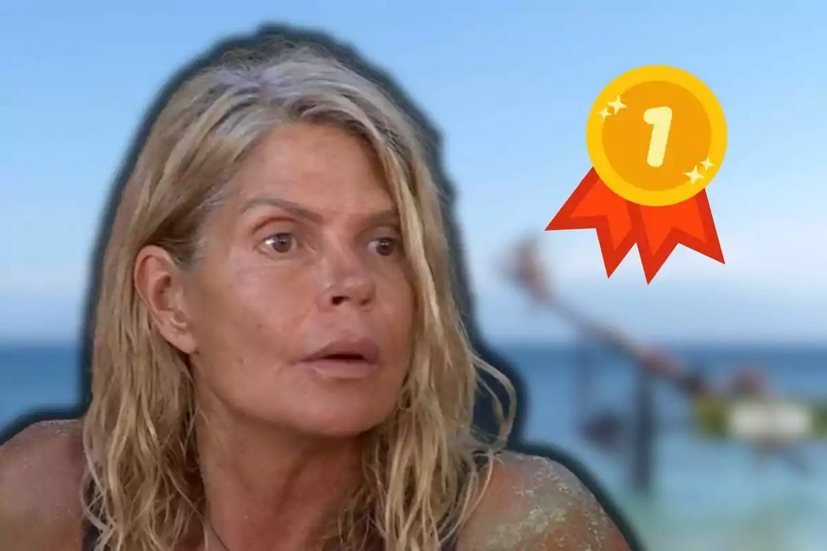 Makoke a la platja amb una medalla de primer lloc superposada.