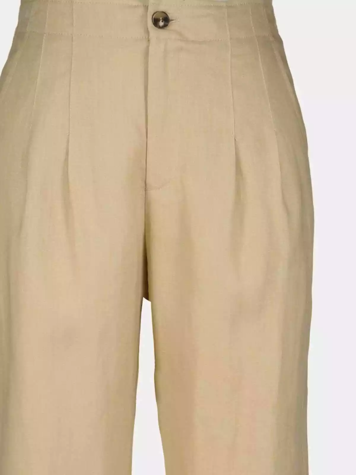 Part d'un pantaló de lli en color beige