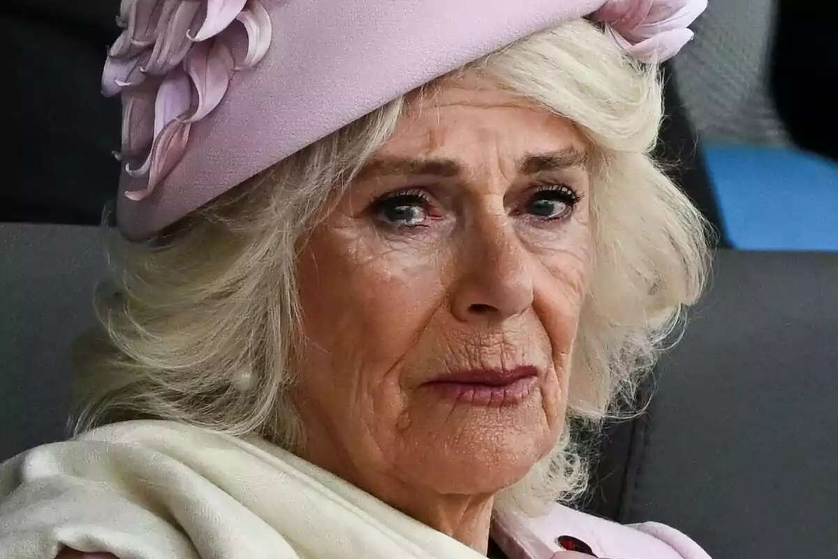 Close-up of Queen Camila crying with a pink headpiece Close-up of Queen Camila crying with a pink headpiece