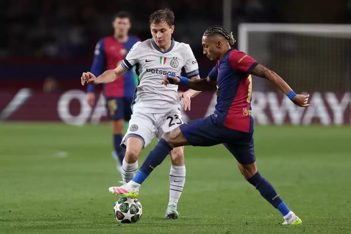 Two players compete for the ball in a match. Two players compete for the ball in a match.