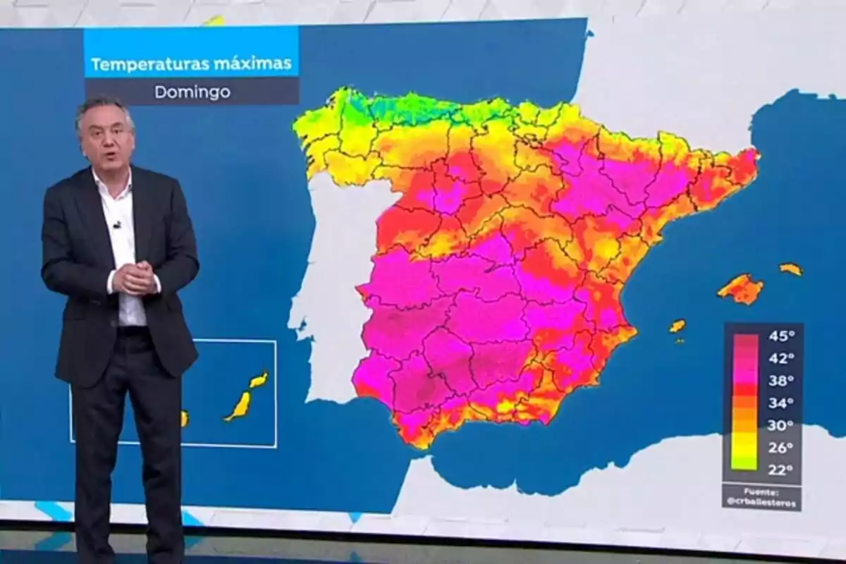 Roberto Brasero al costat d’un mapa d’Espanya per a l’1 de juny de 2025 que mostra temperatures màximes molt altes a la major part del país, amb predomini de colors roses i taronges indicant calor extrema. Roberto Brasero al costat d’un mapa d’Espanya per a l’1 de juny de 2025 que mostra temperatures màximes molt altes a la major part del país, amb predomini de colors roses i taronges indicant calor extrema.