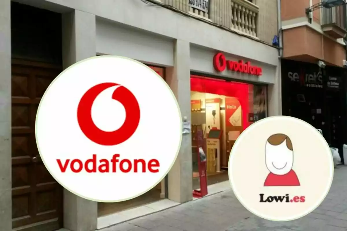 Façana d´una botiga de Vodafone amb logotips de Vodafone i Lowi.es.