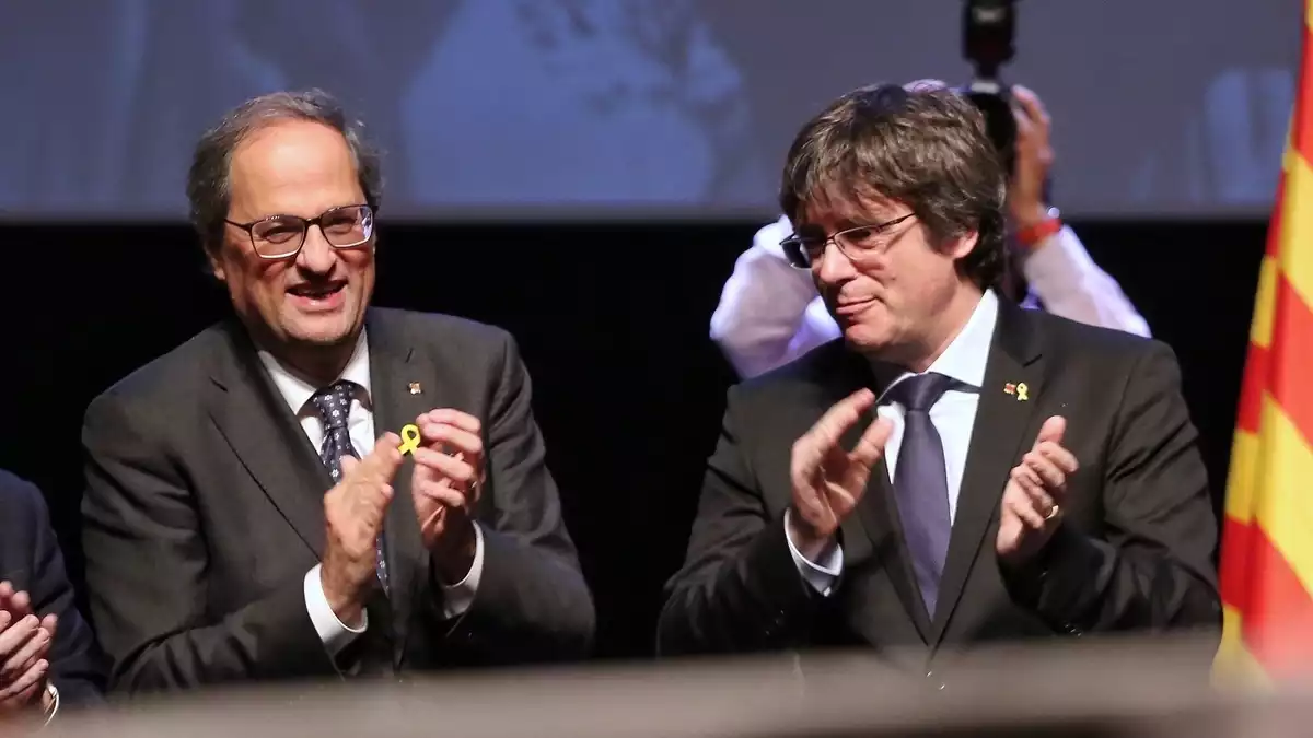 El president de la Generalitat, Quim Torra, i l'expresident, Carles Puigdemont
