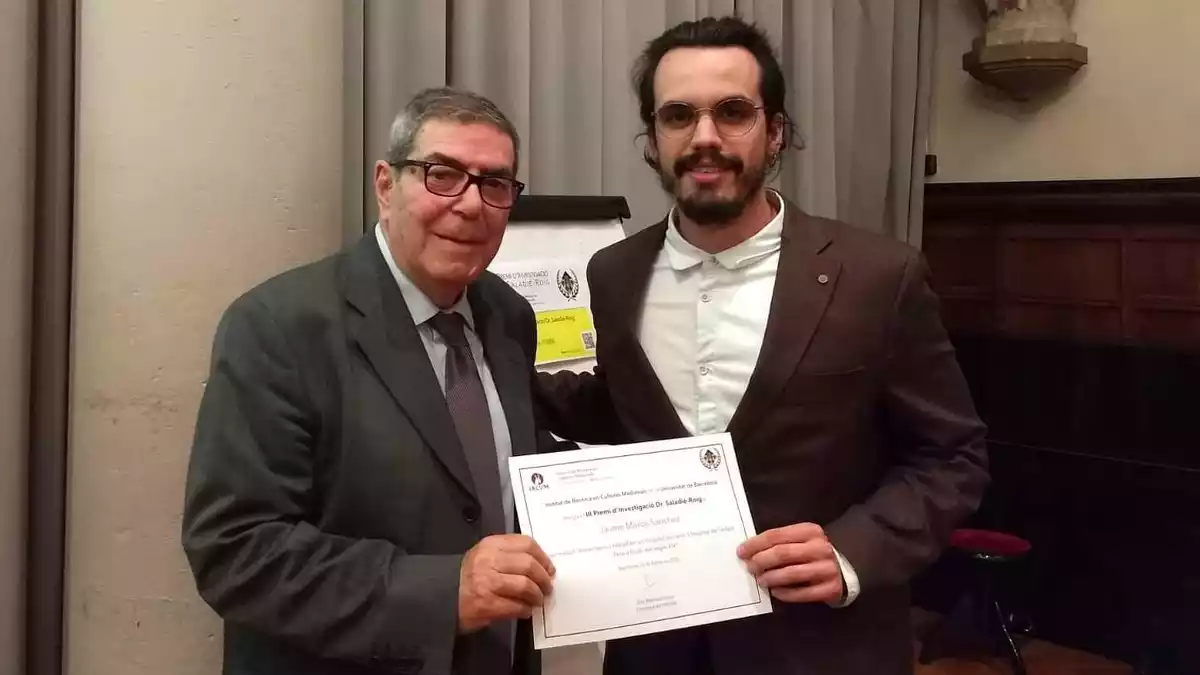 El Dr. Josep M. Saladié-Roig amb el premiat, Jaume Marcé.